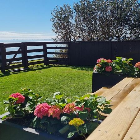Red Rock Cottage, Beachfront Luxury Clarks Beach Buitenkant foto